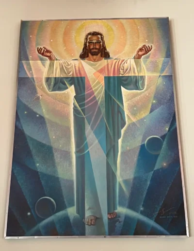 painting of jesus standing on the earth with planets and the sun behind him and an overlapping cross